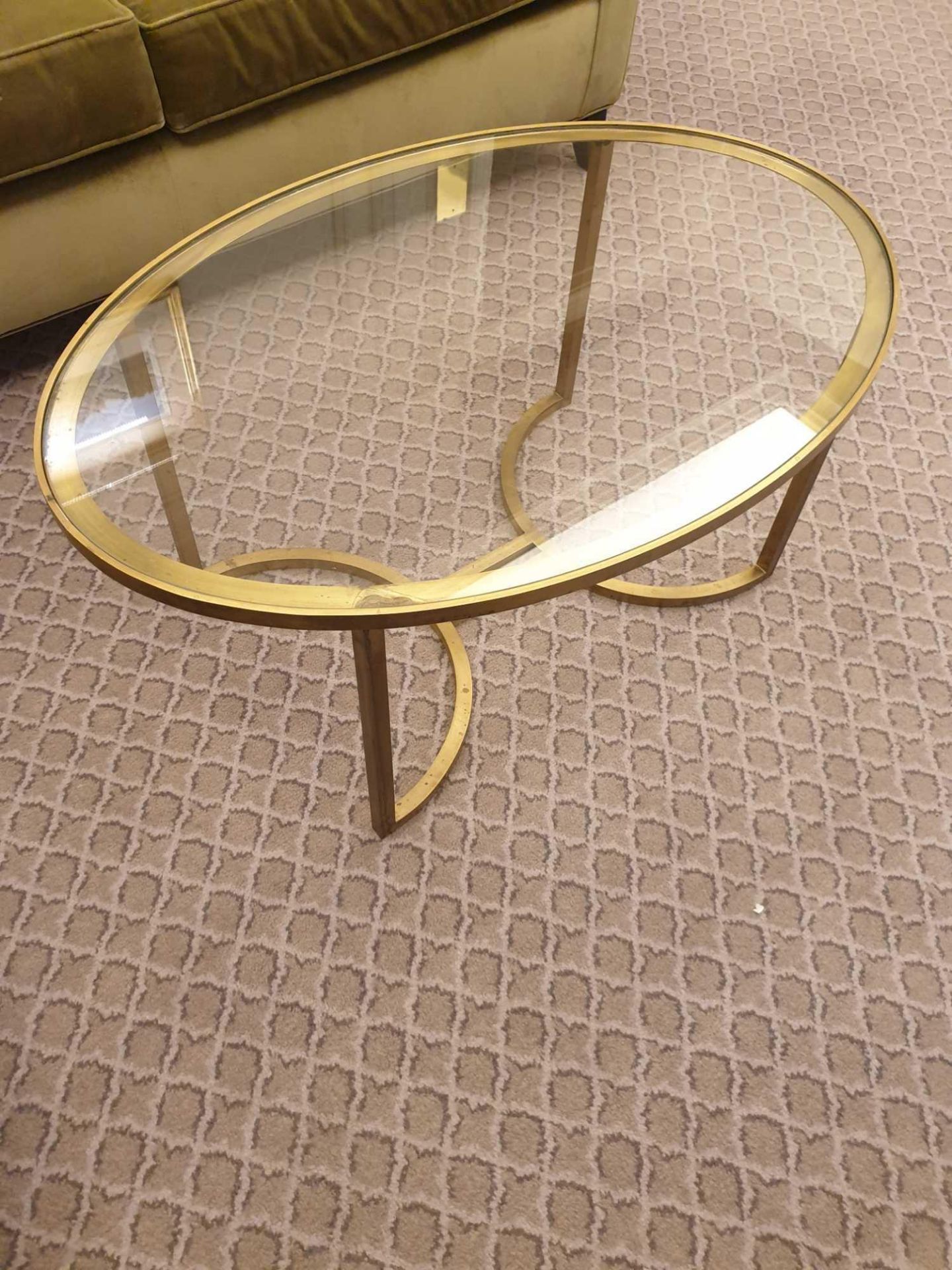 A Gold Ovoid Clear Glass Coffee Table 90 x 60 x 41 (Room 332) (This lot is located in Bath)