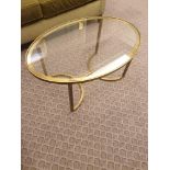 A Gold Ovoid Clear Glass Coffee Table 90 x 60 x 41 (Room 332) (This lot is located in Bath)