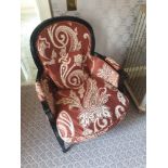 A Pair Of Bergere Chairs Black Wood Frame Upholstered In A Rust Red And Cream Damask Pattern With