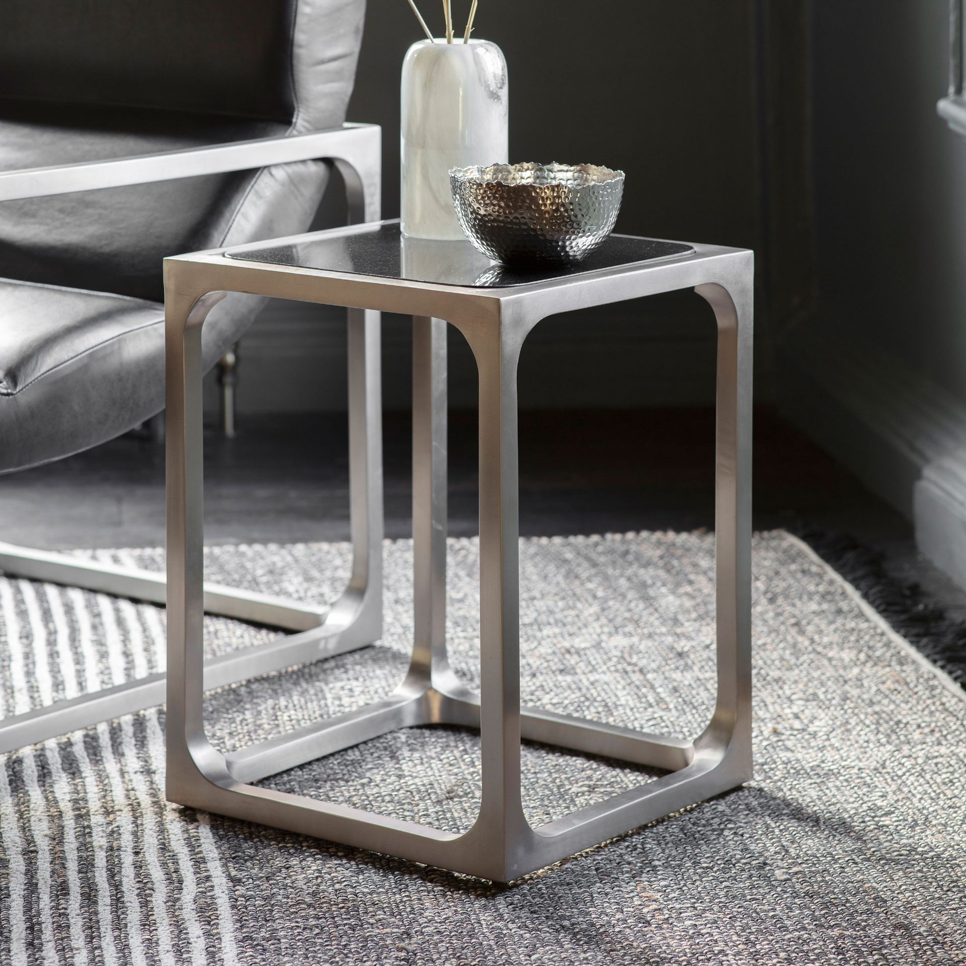 Roma Side Table in Pewter is a visually arresting piece that is perfect for any room if you want