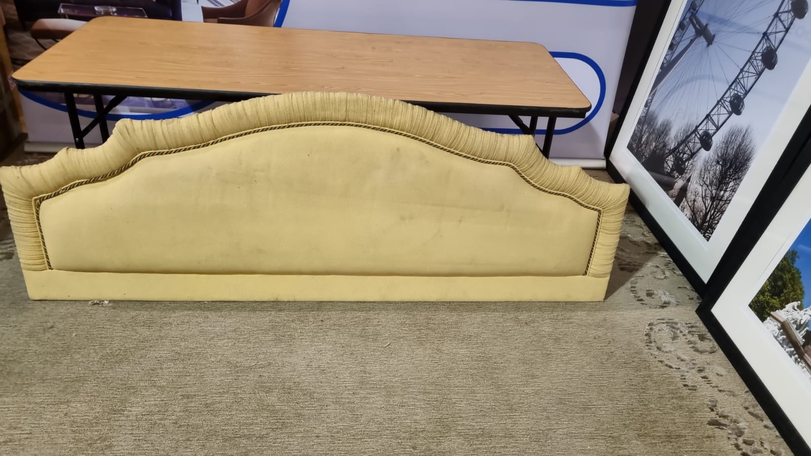 Large yellow headboard luxury padded upholstered with multicoloured piping and pleated top 2000 x