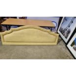 Large yellow headboard luxury padded upholstered with multicoloured piping and pleated top 2000 x