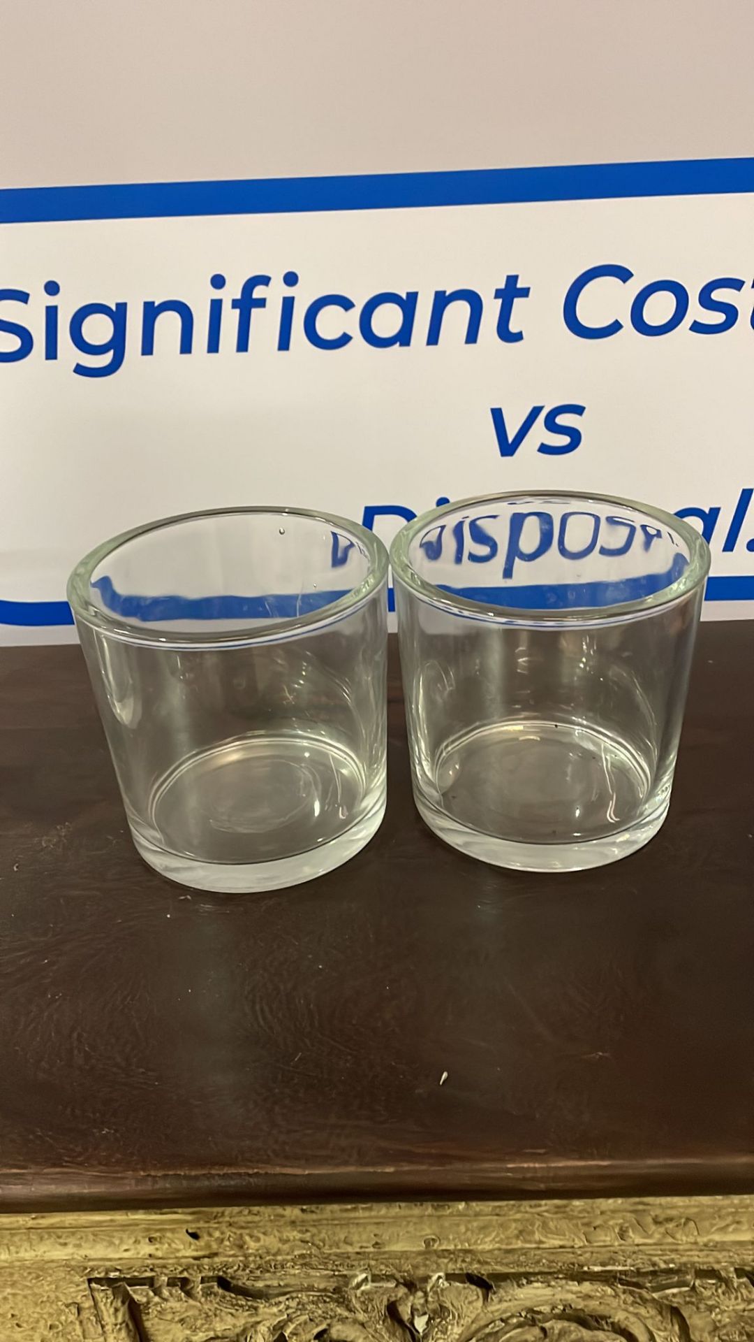 A pair of glass vases 140 (H) x 145mm (D) (SR526)