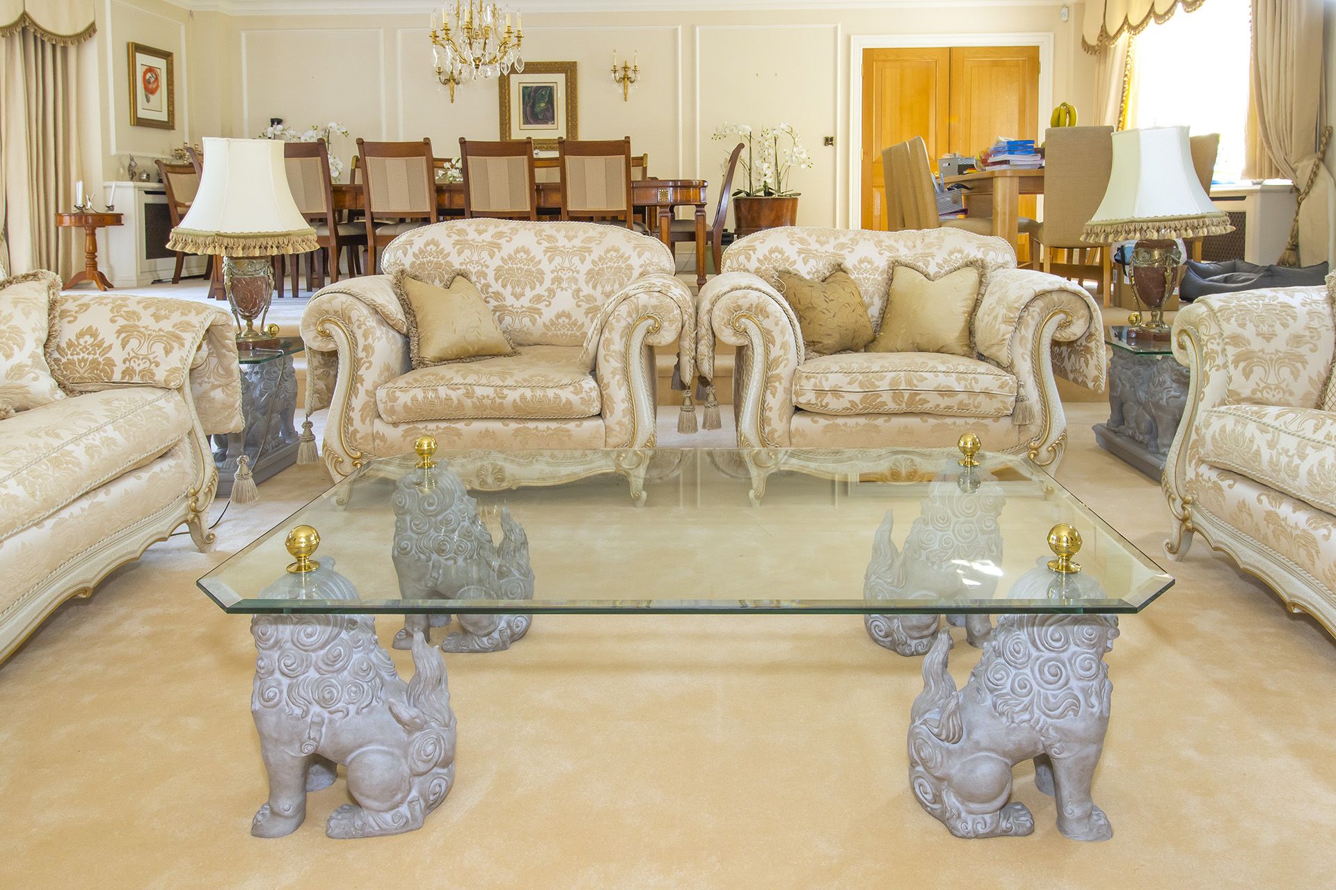 Glass top coffee table supported by a quadrant of guardian lion foo Dog pedestals with brass - Image 4 of 4