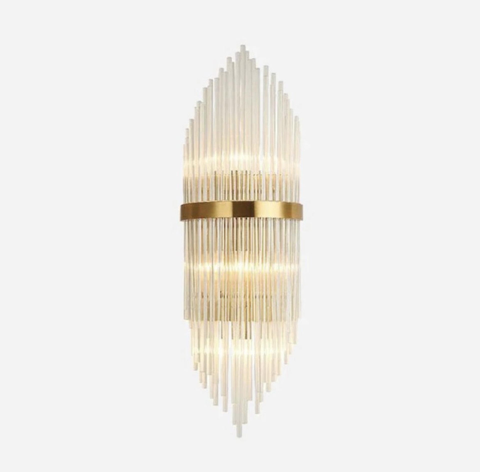 Oriana Crystal Wall Light This exquisite wall sconce is in an antique brass finish. The frame is