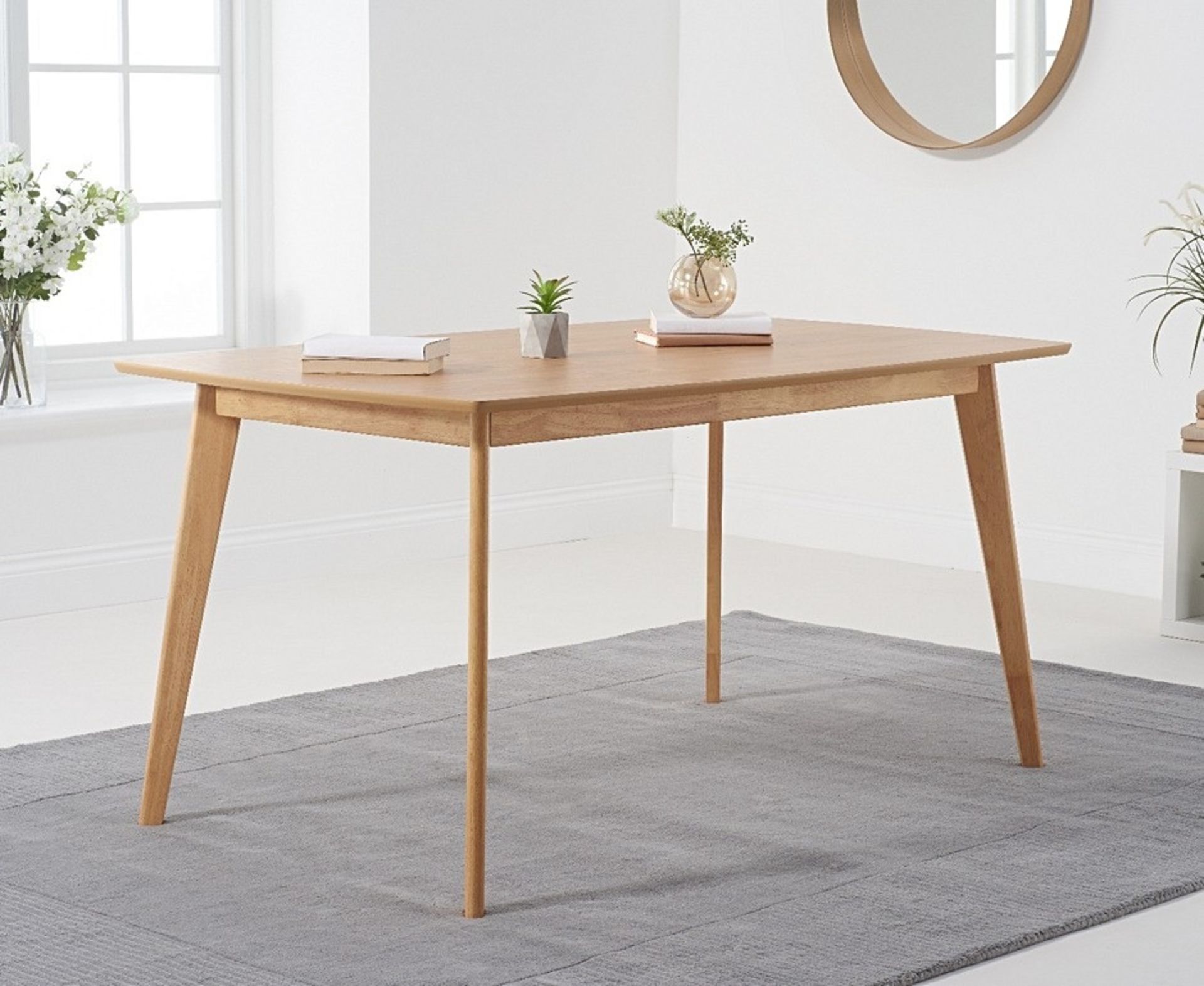 Sacha Oak 150cm Dining TableSacha Collection The Sacha collection combines contemporary lines and