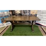 Oak Farmhouse Table This substantial dining table has a chunky rectangular top with a polished