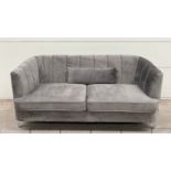 Lulu Two Seater Sofa In Grey Velvet With Steek Legs Reminiscent Of An Exotic Seashell. Exceptionally