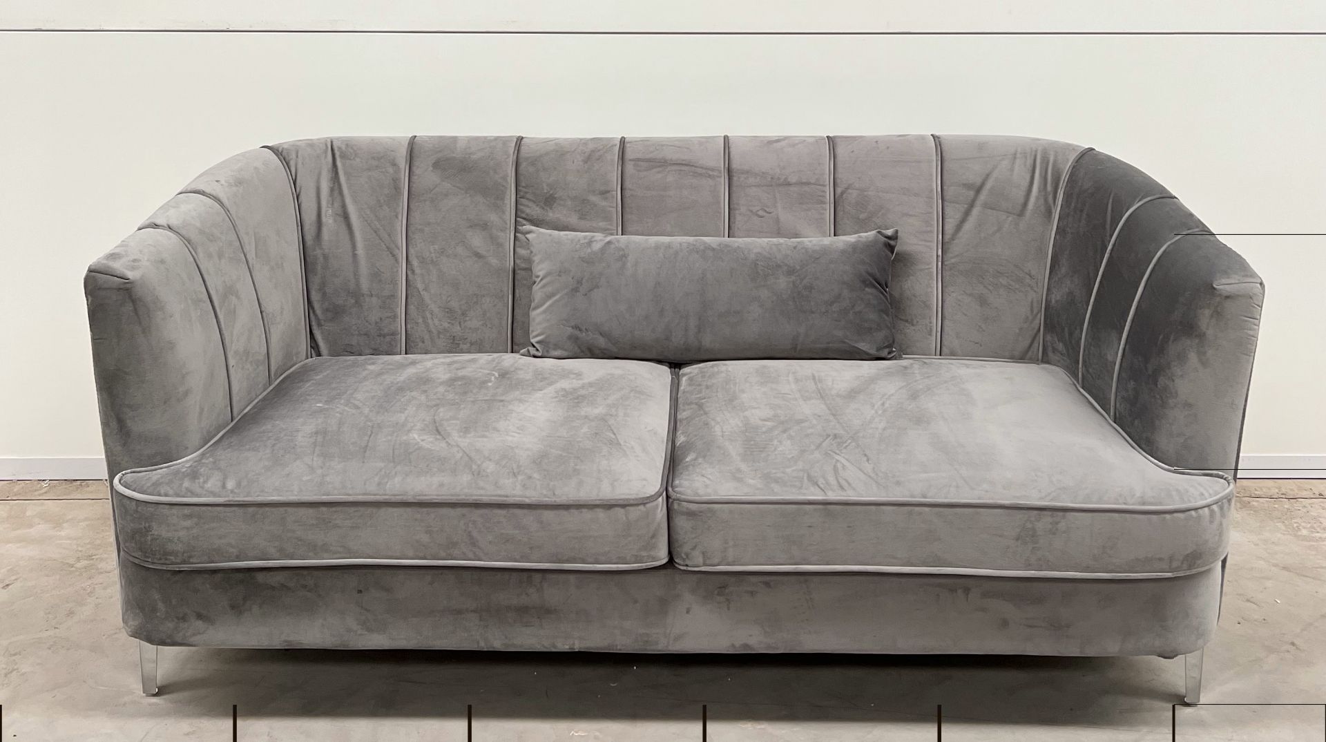 Lulu Two Seater Sofa In Grey Velvet With Steek Legs Reminiscent Of An Exotic Seashell. Exceptionally