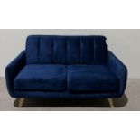 Camila Royal Blue Velvet Sofa Defined By It's Soft Curves And Low Rise Design As Well As Subtle