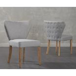 A set of 2 x Isobel Grey Fabric Dining Chair Infuse your dining room with style and drama with the