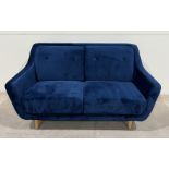 Lance Two Seater Sofa In Royal Blue Upholstery And Light Ash Leg Finiish This Welcoming Shape Is
