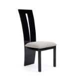 A set of 4 x Verbier Solid Wood Black Dining Chairs The comfy fabric seat of the Verbier complements