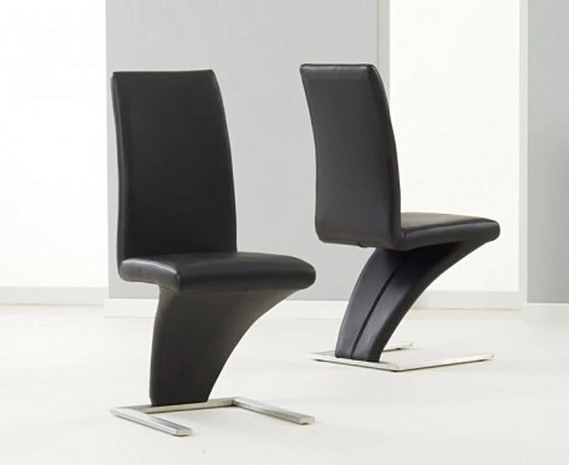 A set of 4 x Hampstead Z Black Faux Leather Dining Chairs striking chrome and faux leather design