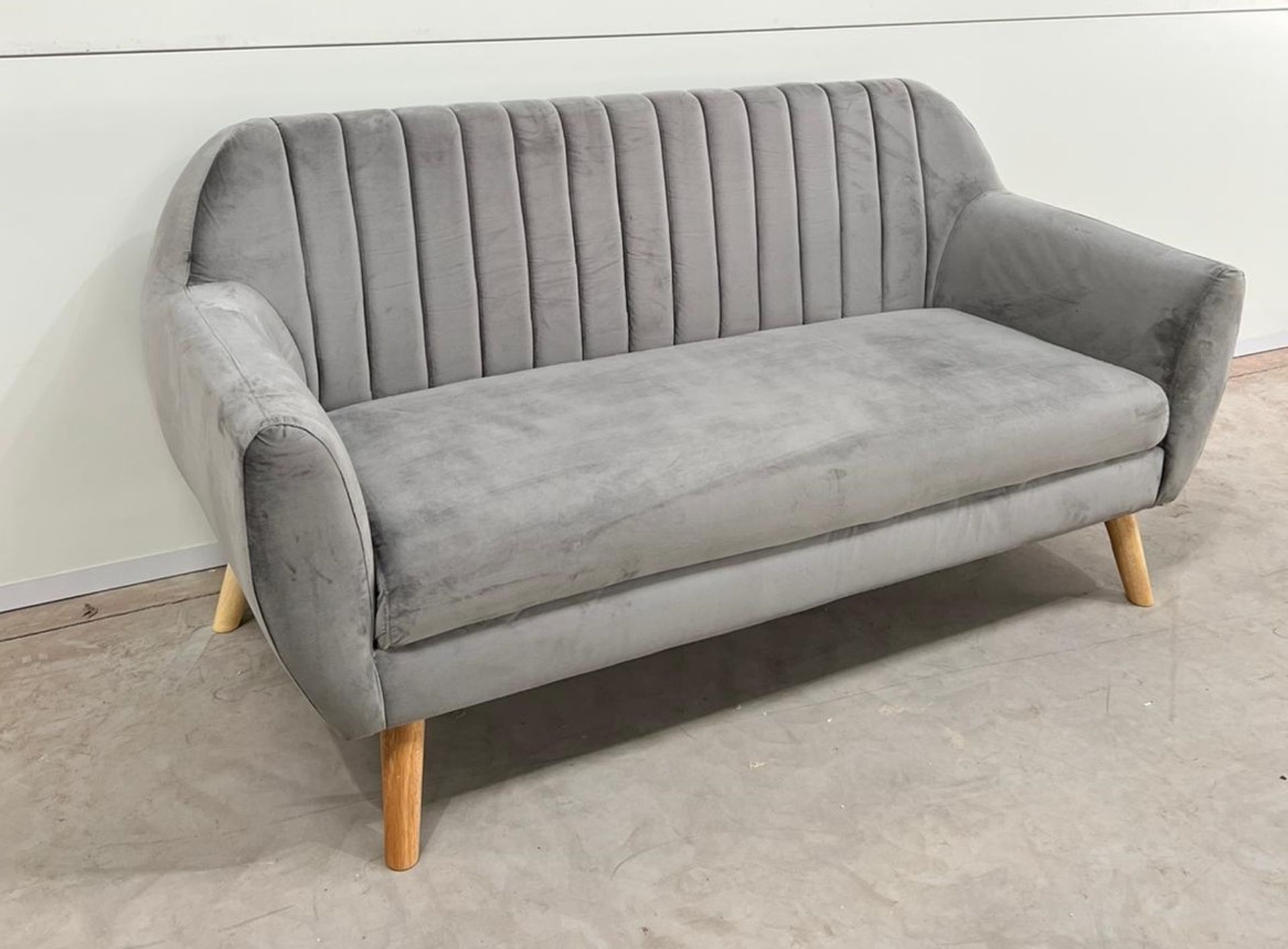 Grey Plush Sofa Make A Striking Impression In Any Home Combination Of Contemporary And Classic