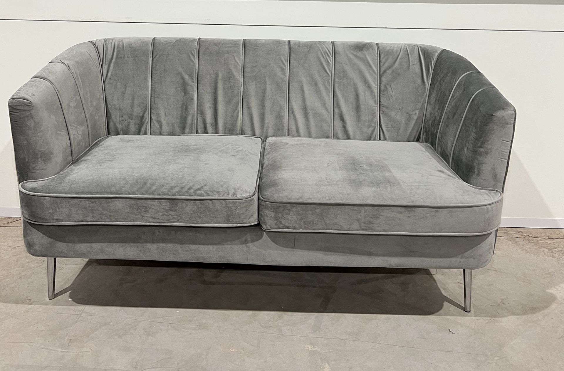 Lulu Sofa In Grey Velvet With Steel Silver Metal Legs Reminiscent Of An Exotic Seashell.