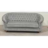 Chloe Chesterfield Style Grey Plush Fabric Three-Seater Sofa With Deep-Buttoning Creates A
