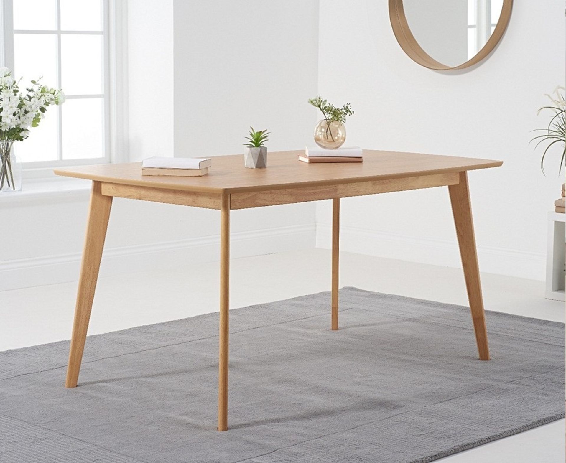 Sacha 120cm Dining Table The Sacha collection combines contemporary lines and shaping with sturdy,