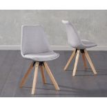 A set of 2 x Oscar Grey Faux Leather Square Leg Dining Chair The retro Oscar has a curved Scandi-
