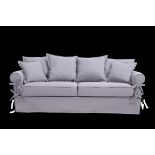 Clement Grey Linen 3 Seater Sofa With pretty bow detailing, edged cushions and skirting, the Clement