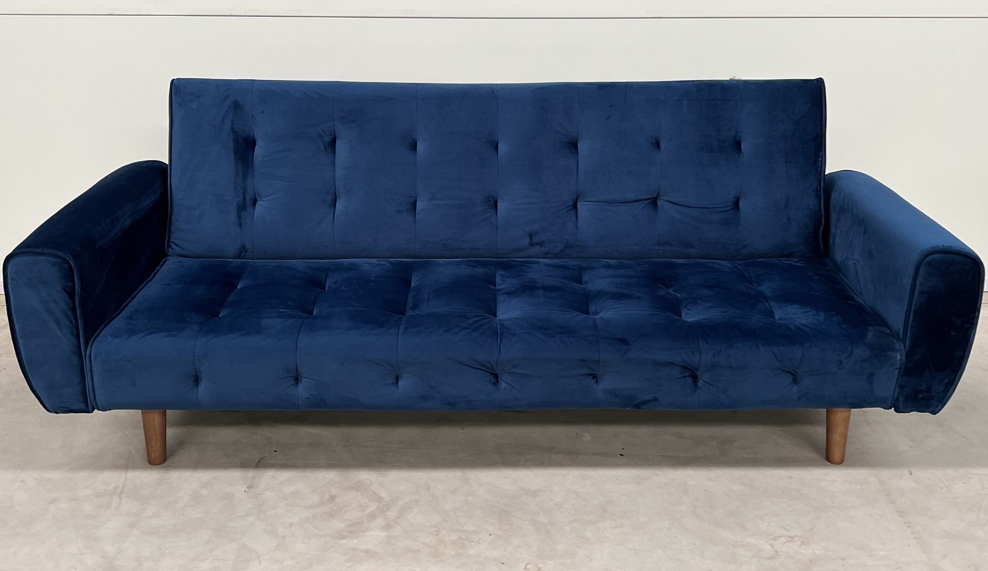 Vanessa Sofa Bed In Blue Velvet Combining Style And Comfort, Generously Padded, With A Buttoned