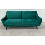 Lance Three Seater Sofa In Green Velvet Legs Finished In Black Legs This Welcoming Shape Is Hugged