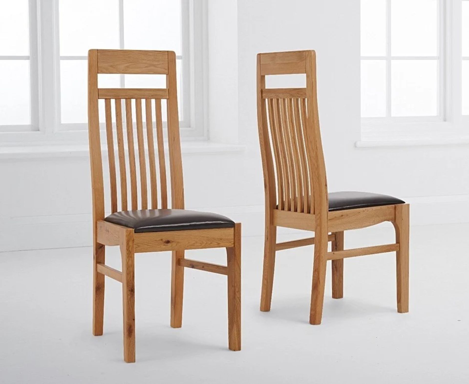 A set of 2 x Monaco Solid Light Oak and Brown Chairs Give your home a splash of the French Riviera