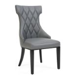 Freya Faux Leather Dining Chair the Freya chair commands attention with a intriguing shape.
