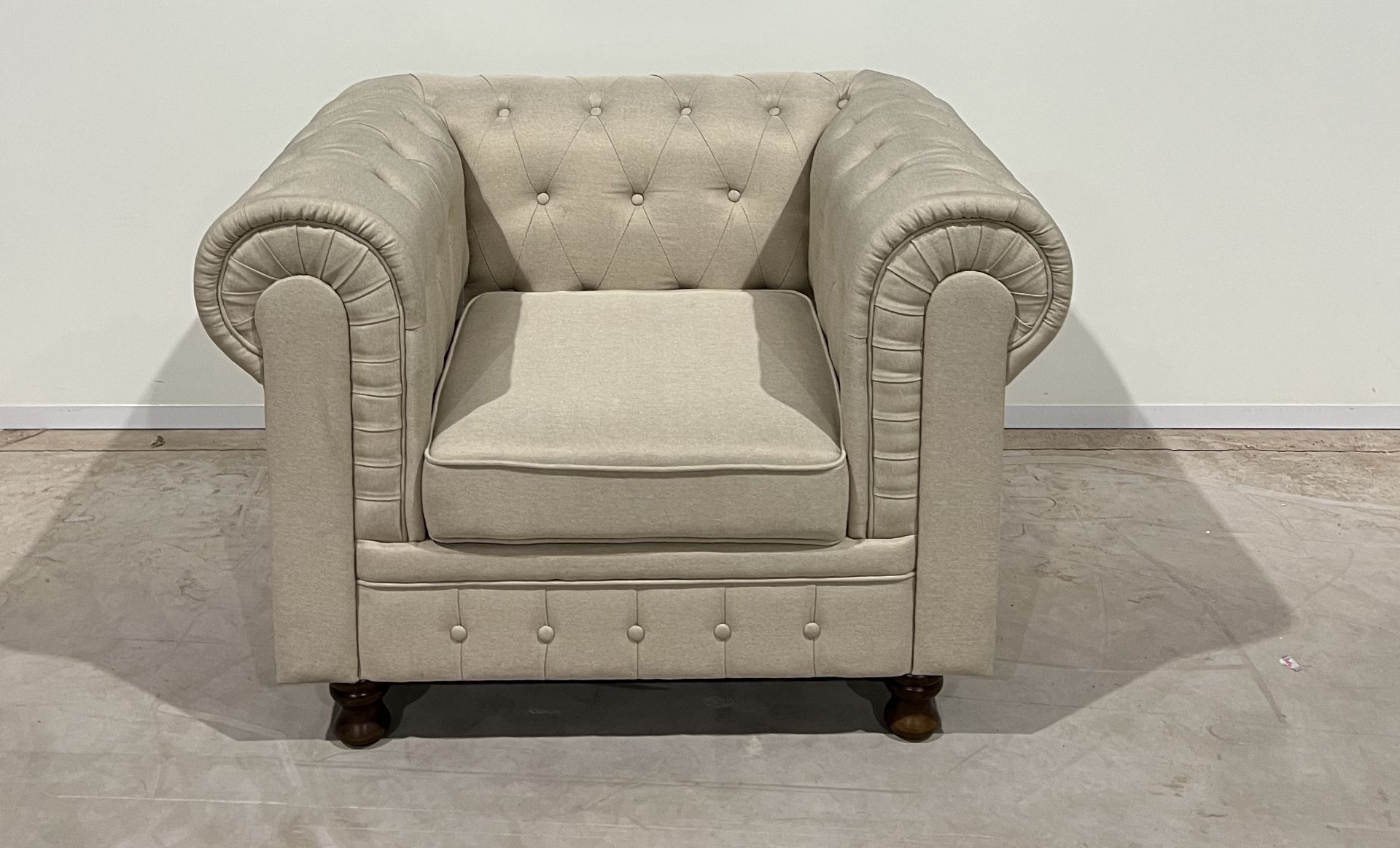 Natural Linen Chesterfield Style Armchair The Traditional Rolling Armrests And A Sumptuously Deep-