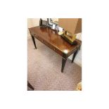 A Kingswood And Rosewood Writing Desk With Brass Trim And Marquetry Inlay Mounted On Four Tapering