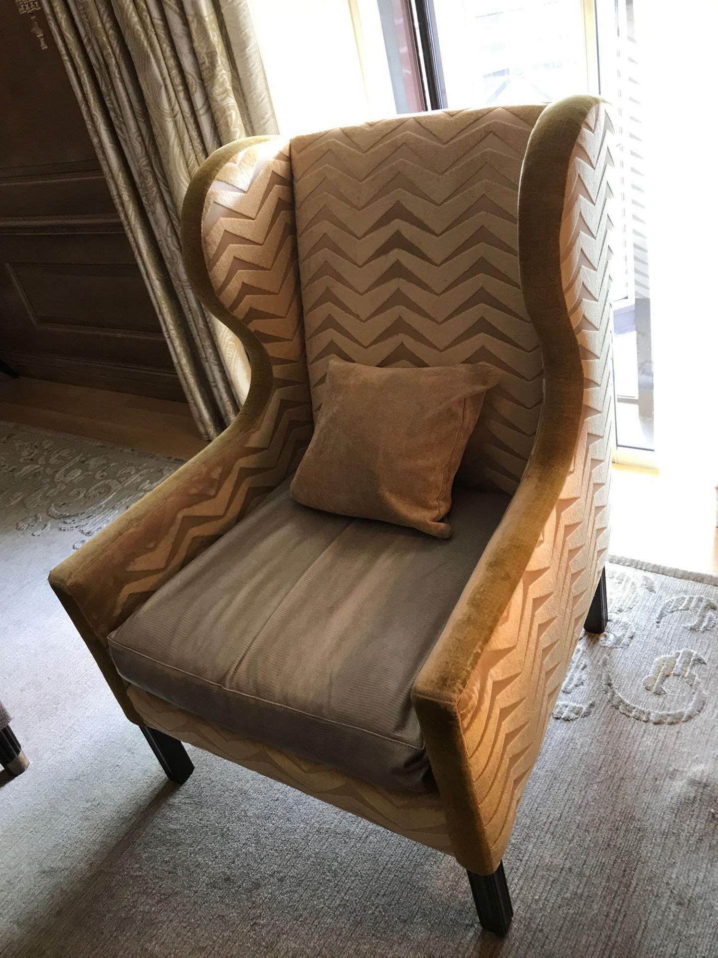 A Wingback Chair With Gold Chevron Fabric 78 x 62 x 106cm