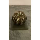 Mace brass decorative item on stand decorative ball covered with small liitle nubs for texture and