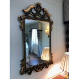 Chinoiserie black lacquer ornate carved mirror with gilt detail 72 x 125cm