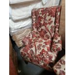 Upholstered Wingback Fireside Chair In A Damask red Fabric With cream Leaf Pattern upholstry and