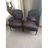 A pair of Ã‚ Bergere Chair Black Wood Frame Upholstered In A Dark Mauve Pattern With Stud Pin Detail