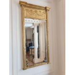 A Regency Style Giltwood Pier Mirror Flanked By Spirally-Turned Half Pilasters The Frieze With
