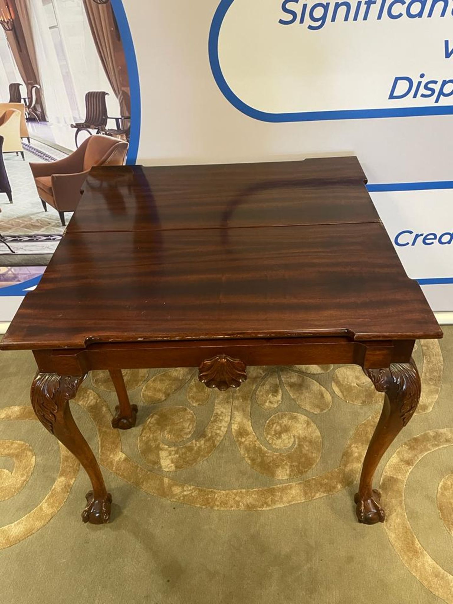 A George II style mahogany tea table With central drawer on carved acanthus knees and ball & claw - Bild 5 aus 5