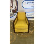 A polished mahogany framed reading chair upholstered in a yellow subtly patterned fabric 60 (P) x 65