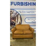 Barbican Medium 2 Seater Leather Sofa a distinctive curved silhouette and stitched back detail for a