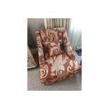 A pair of Egerton Armchairs Sloping Arms Dressmakers Skirt And A Sprung Back In A Damask red