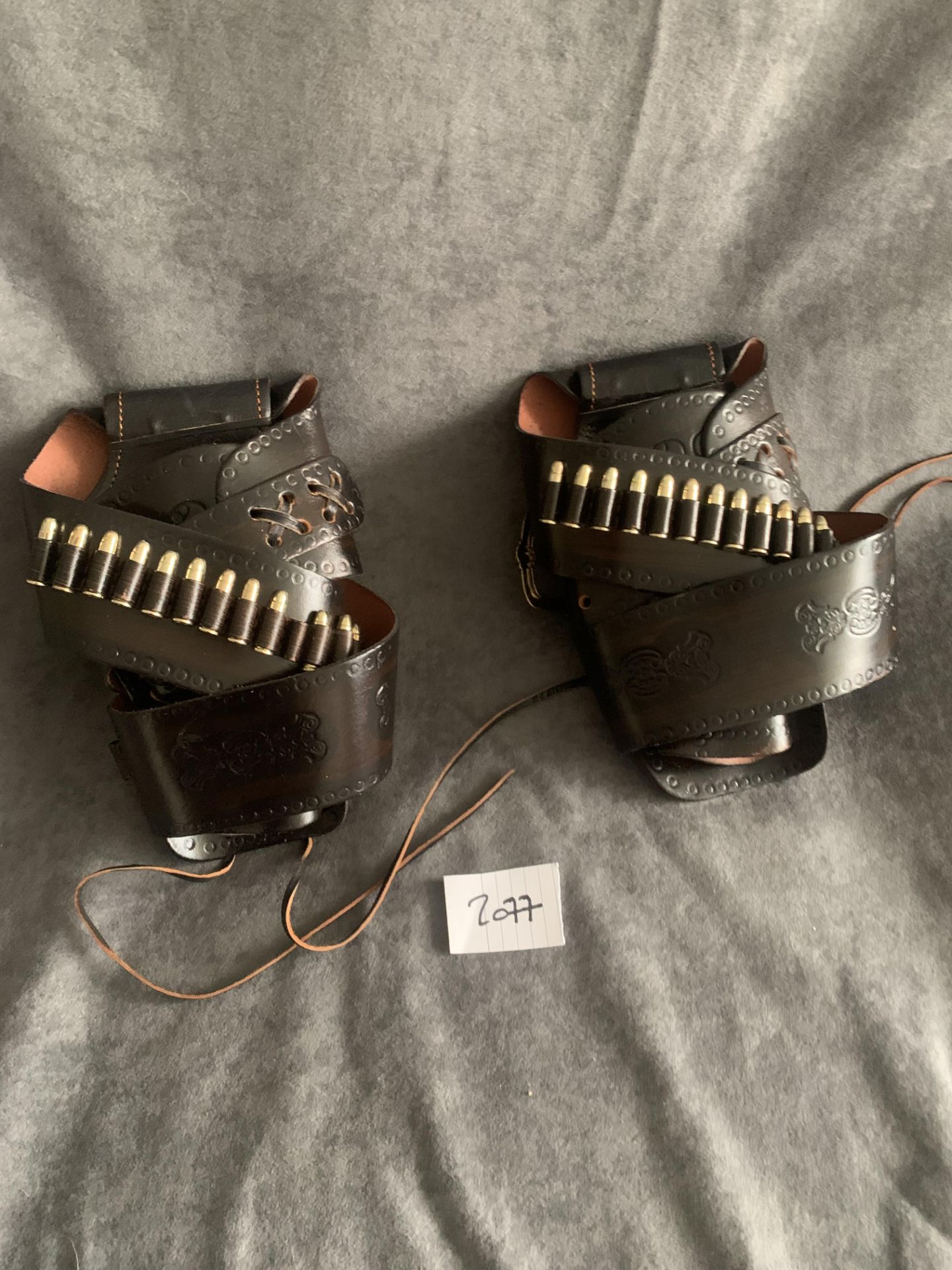 A Pair Of Colt Holsters With Bullets