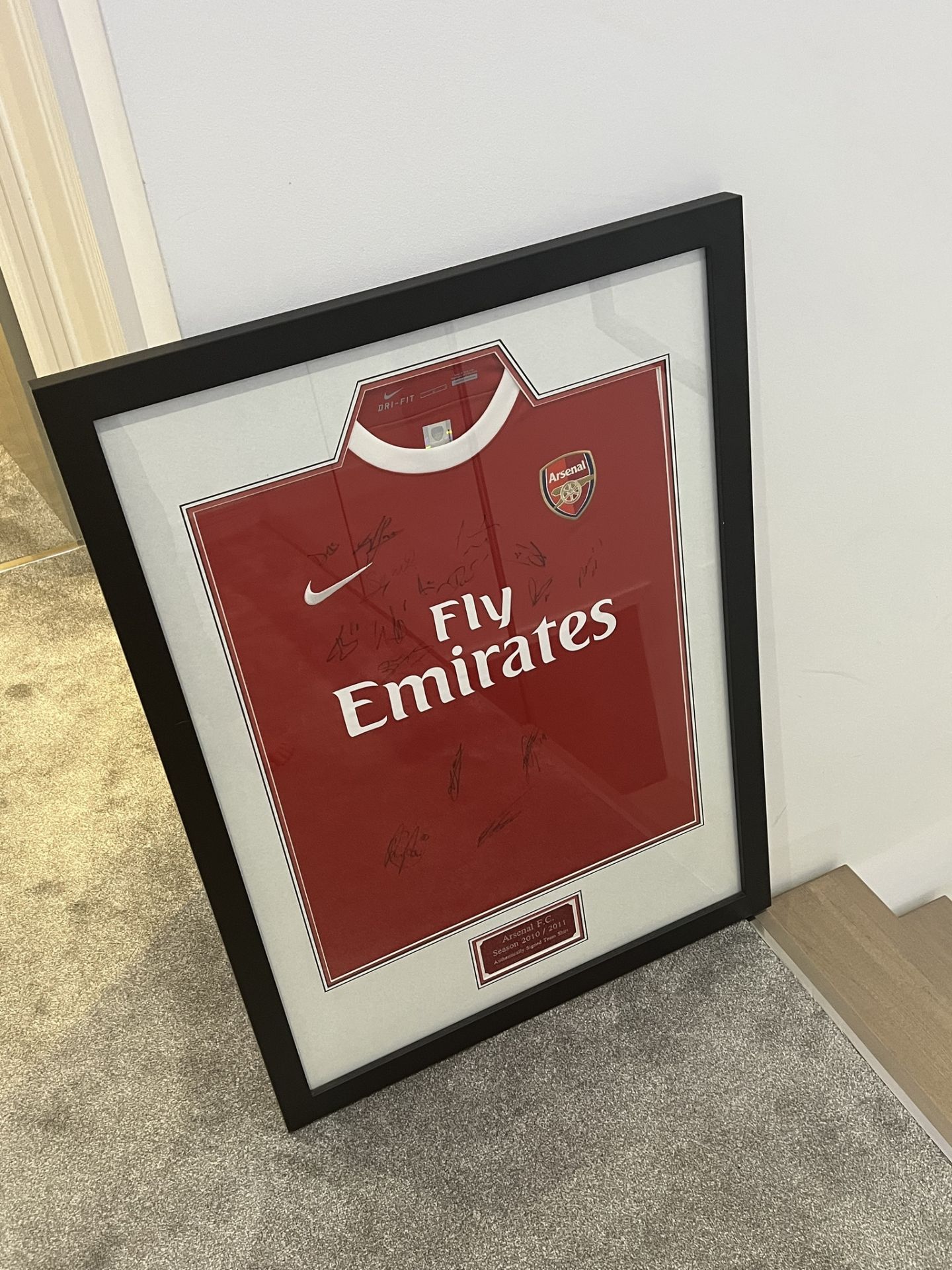 Authentic signed 2010/11 football shirt presentation hand signed by Arsenal F. C. . Presented in a