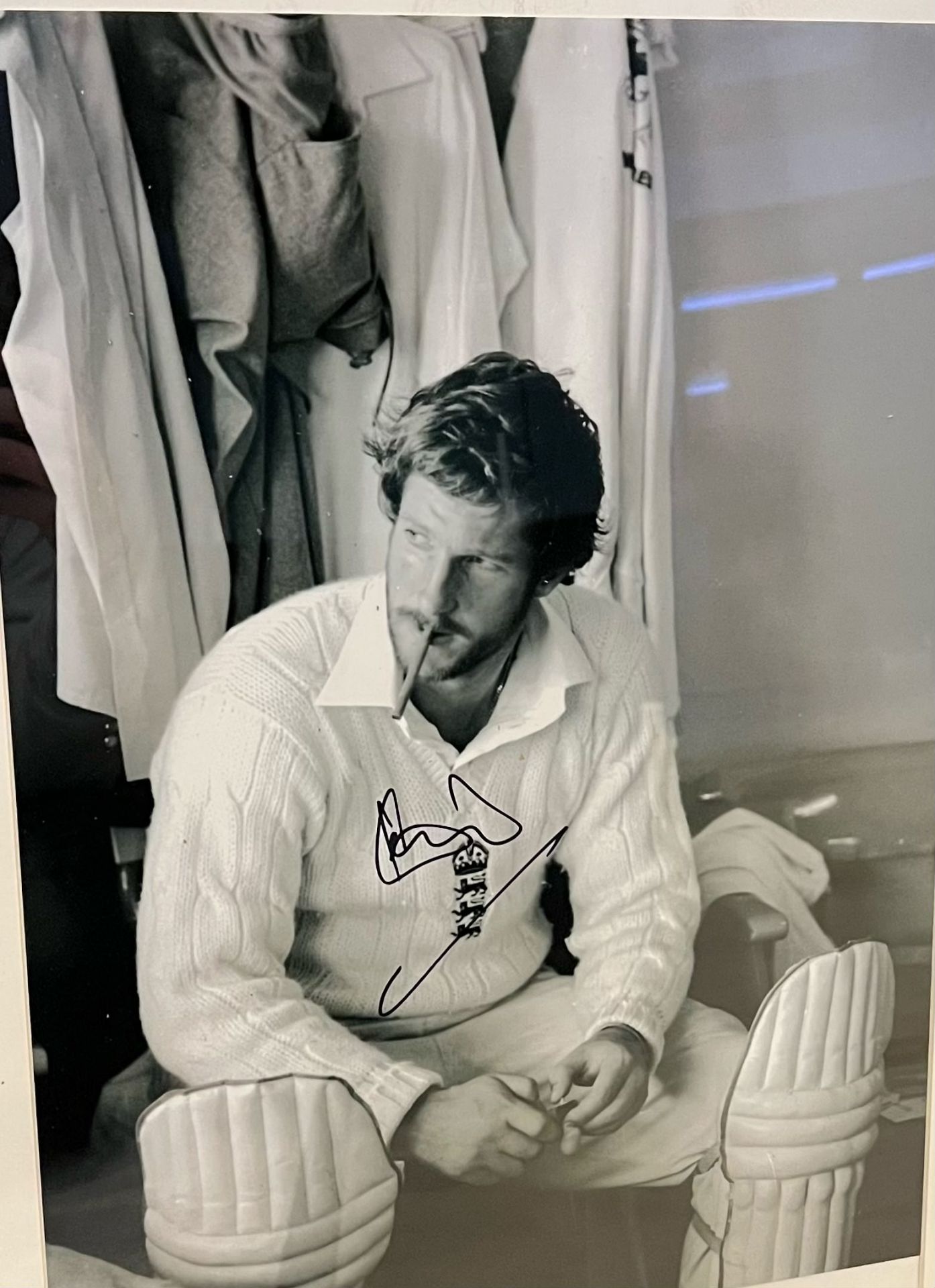 Authentic Sir Ian Botham Signed Photo: Dressing Room Cigar Break - This famous photo shows Sir Ian