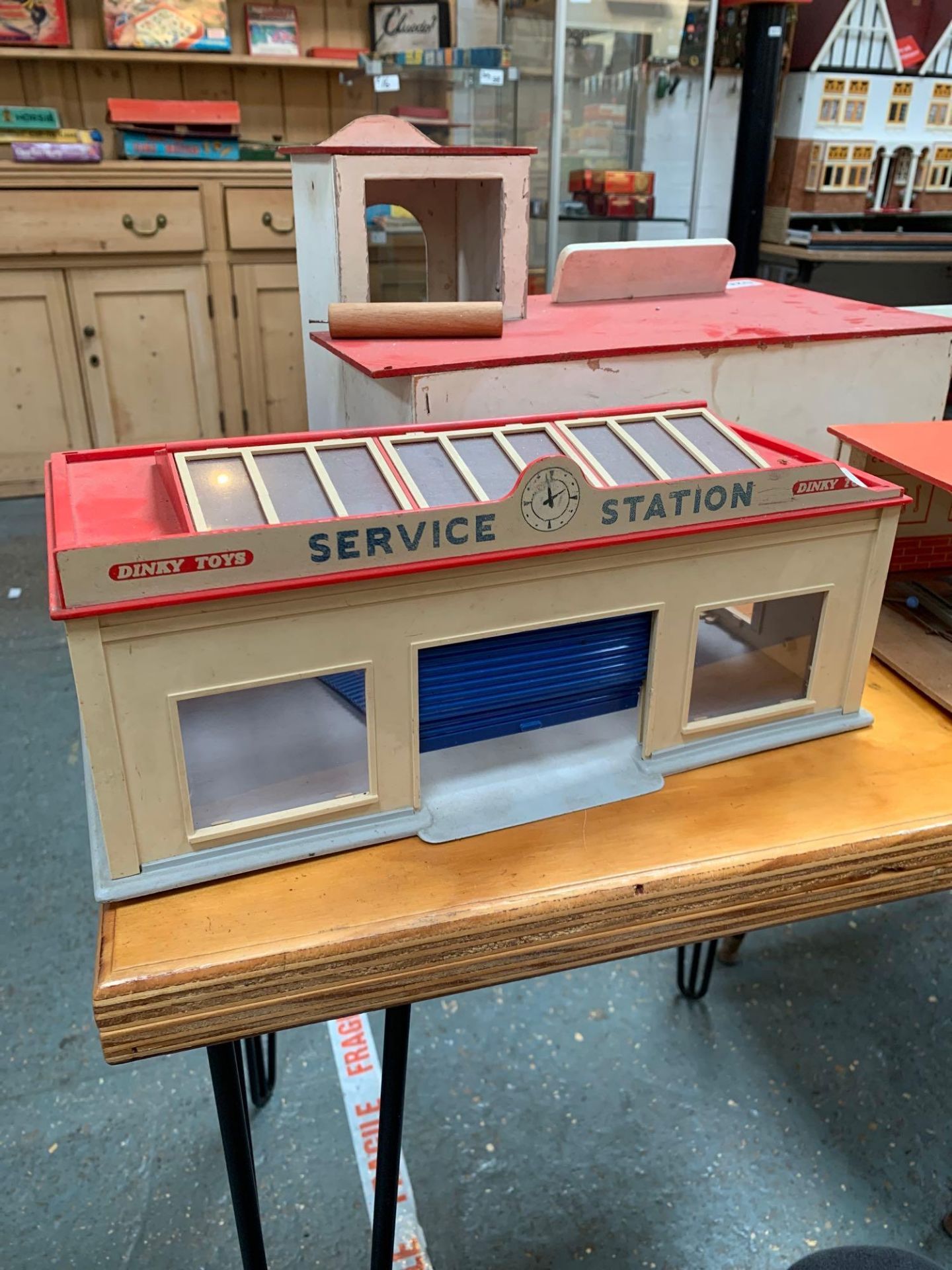 Dinky Toys Service Station Made From Plastic With Blue Roller Door One Of Two Doors Is Not Connected