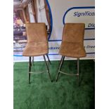 A pair of Palmer Bar Stools A contemporary design with a rustic twist, this stylish vintage brown