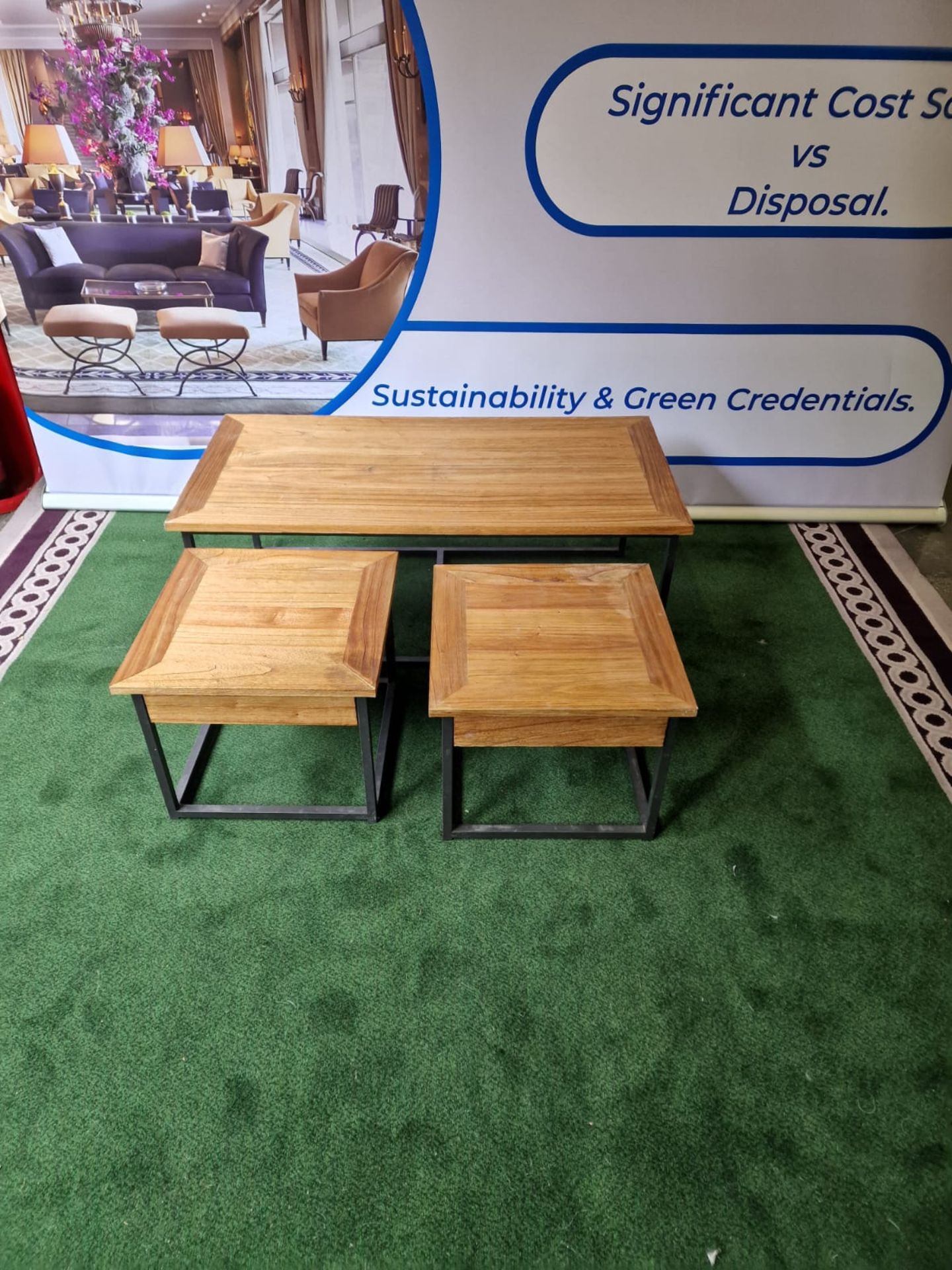 A nest of 3 Wooden tables on black metal frame comprising of 1 x coffee table 118cm x 60cm x 43 cm &