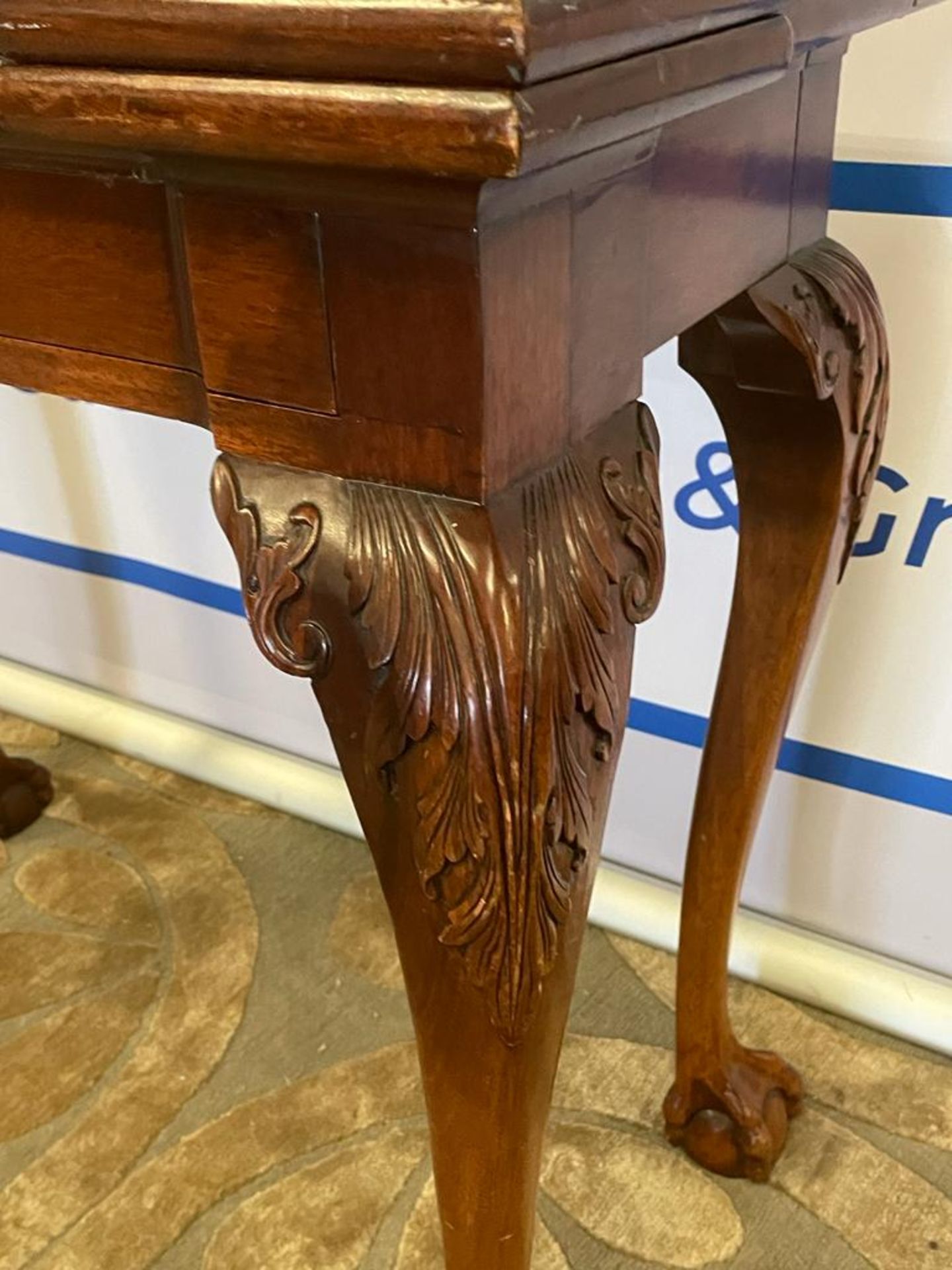 A George II style mahogany tea table With central drawer on carved acanthus knees and ball & claw - Image 2 of 5