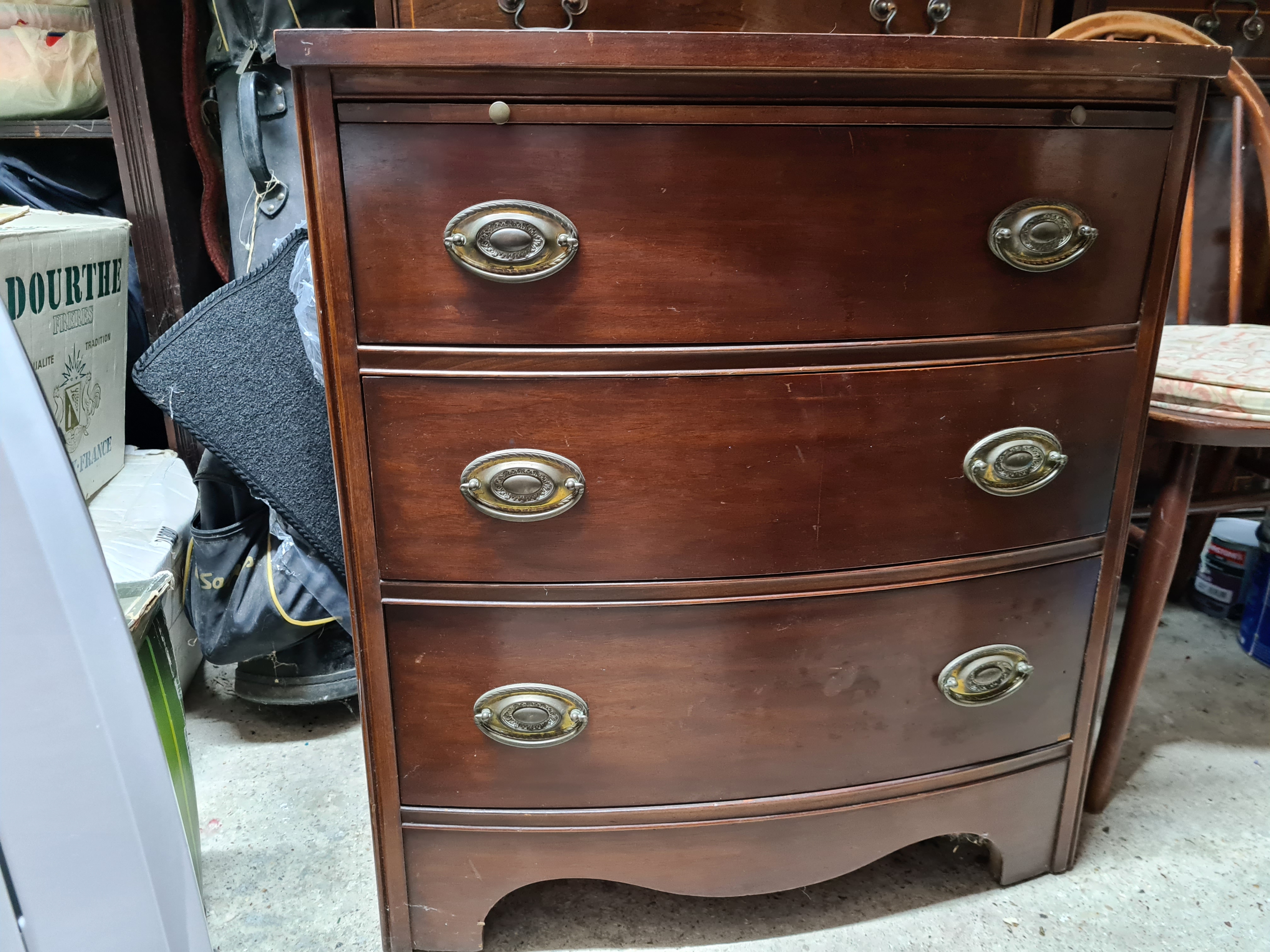 A George III Style Mahogany Bowfront Chest With Three Long Graduated Drawers, On Splayed Bracket