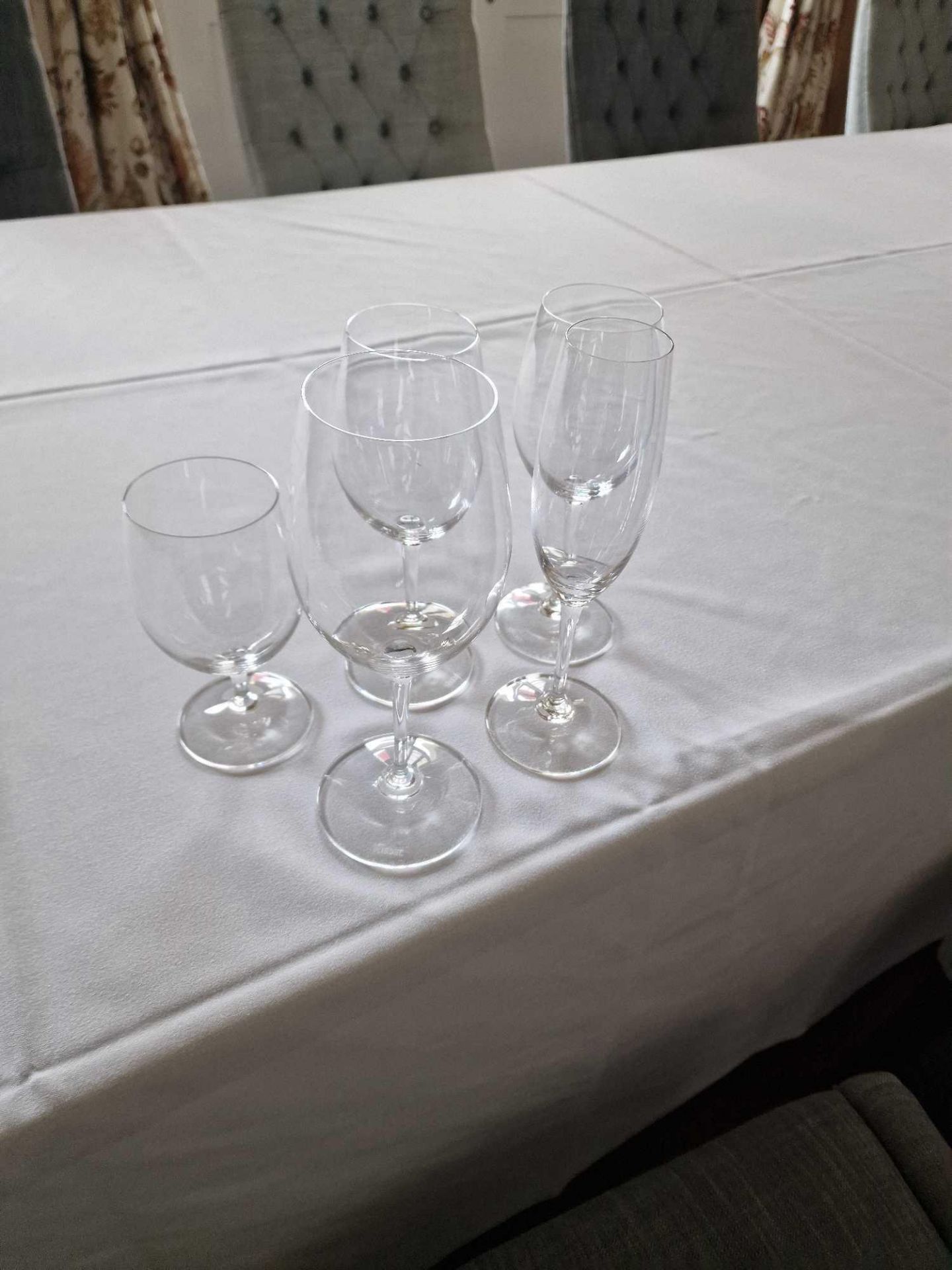A Large Quantity Of Various Glassware As Found Principally Riedel Brand
