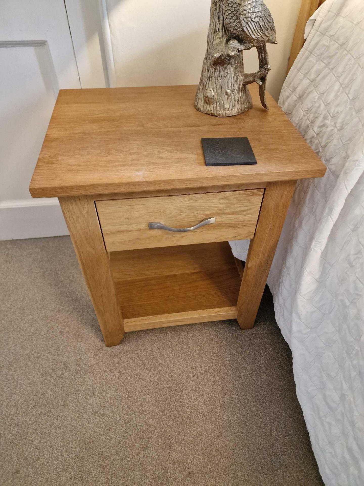 A Pair Of Bedside Tables Light Oak Finished With A Satin VarnishÃ‚ Highlights The Natural Grain Of